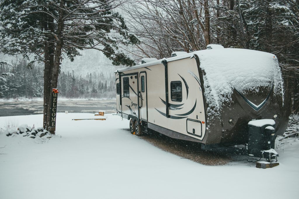 Travel trailer in a winter setting